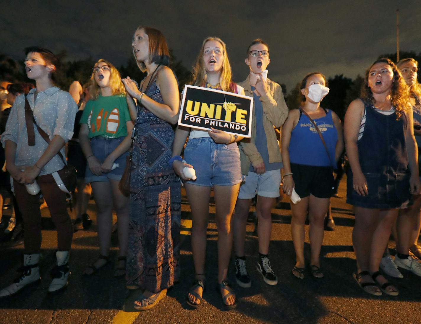 Protesters chanted near the governor's residence in St. Paul during a demonstration on July 26 where police cleared people who were blocking Summit Avenue.