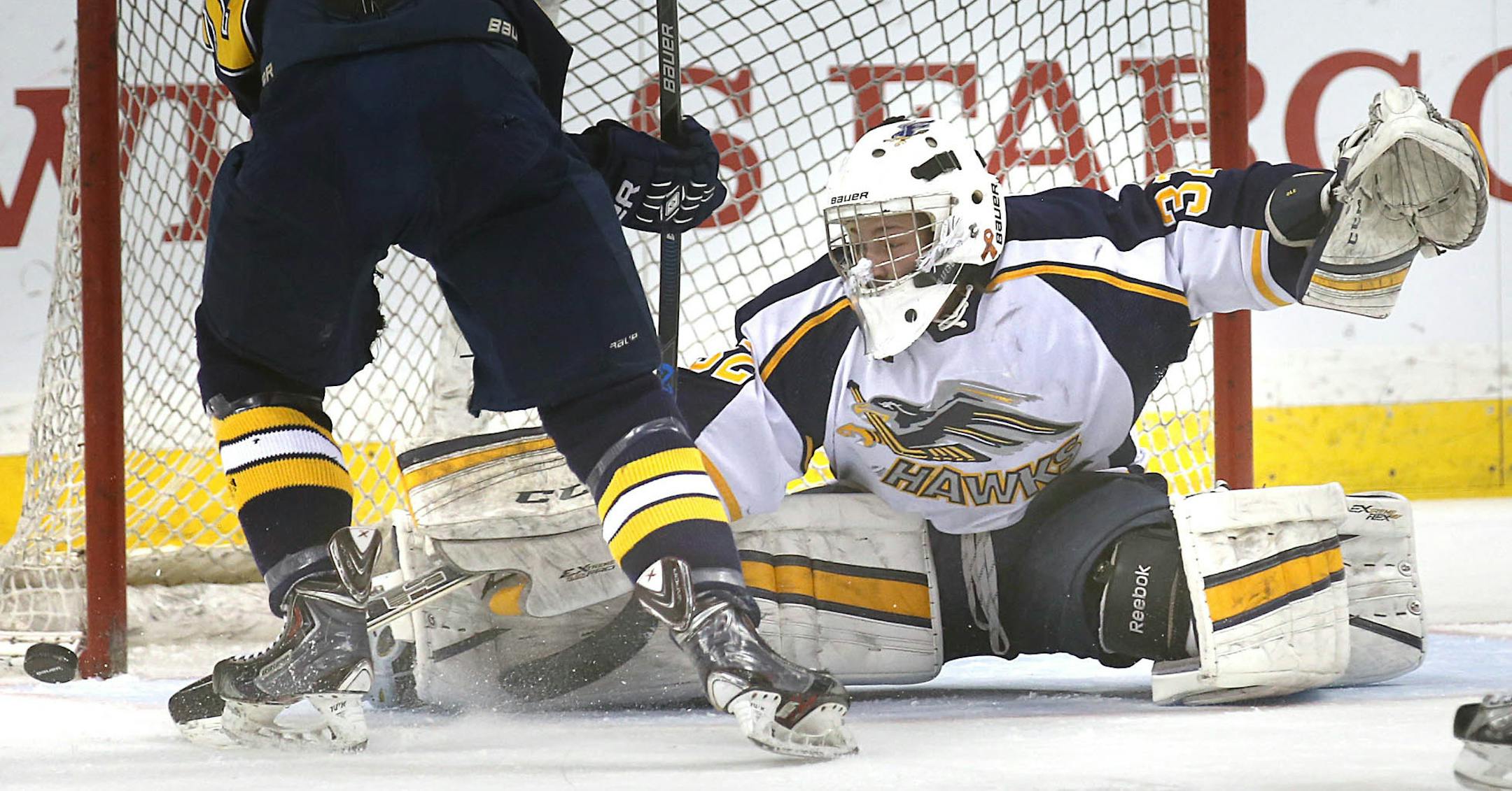 Hermantown goalie Luke Olson made a first period save against Breckís William Blake.] JIM GEHRZ ï james.gehrz@startribune.com / St. Paul, MN / March 5, 2016 /12:00 PM ñ BACKGROUND INFORMATION: Breck School played Hermantown High School in the Class 1A championship game at the Xcel Energy Center at the 2016 Boysí State Hockey Tournament.