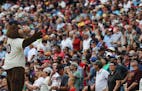 T.C. leads the fans in cheers during a 6-1 win against the New York Yankees at Target Field in Minneapolis on Wednesday, July 19, 2017. The Twins won,