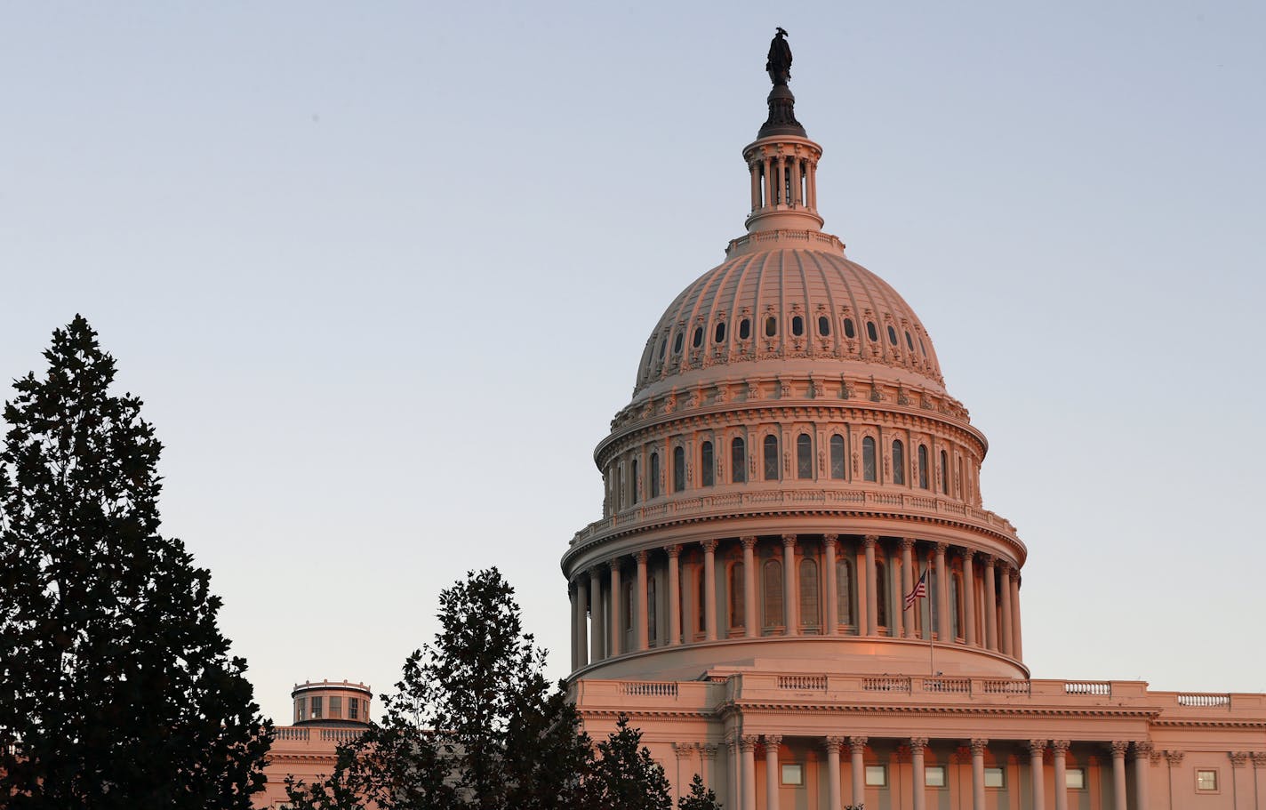 FILE - This Nov. 18, 2016, file photo, shows the U.S. Capitol dome at sunset on Capitol Hill in Washington.