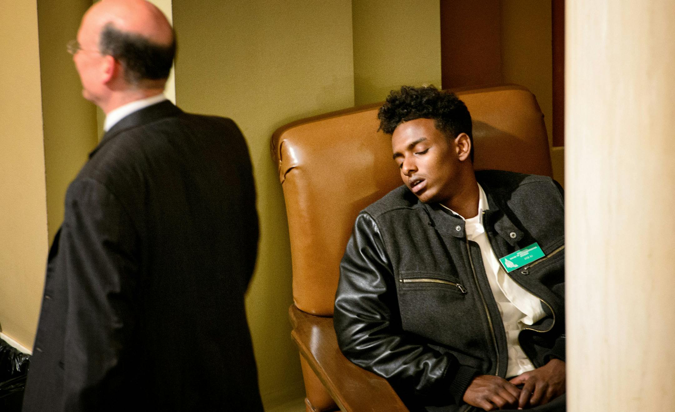 House intern Ayub Ali took a quick nap in the alcove of the House floor. The House worked almost until dawn then was back in session at 11:00 a.m. ] GLEN STUBBE * gstubbe@startribune.com Monday, May 18, 2015