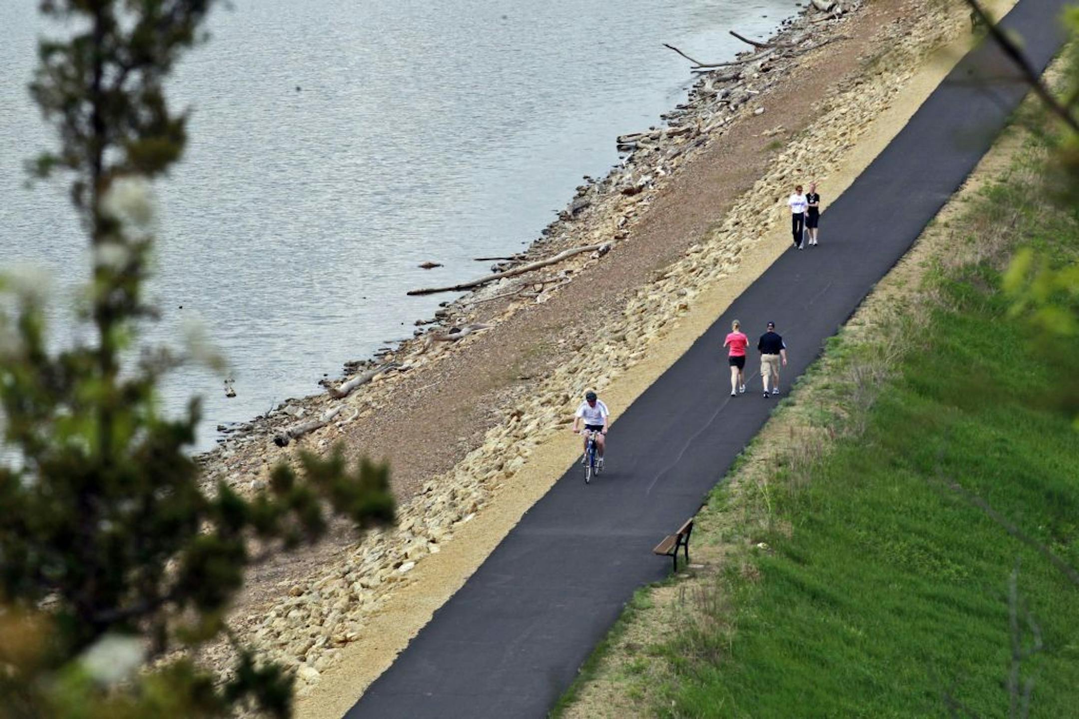 The Hastings bike trail crosses an earthen dam along the Mississippi River.
