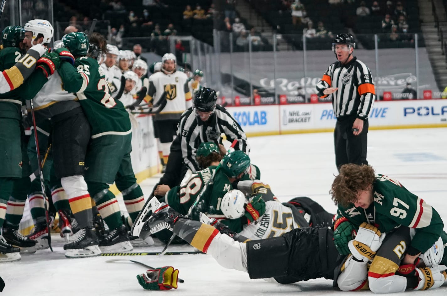 Minnesota Wild left wing Kirill Kaprizov (97) and Vegas Golden Knights defenseman Zach Whitecloud (2) fought on the ice as a big fight broke out when Minnesota Wild left wing Kirill Kaprizov (97) was checked from behind in the first period. ] RENEE JONES SCHNEIDER ¥ Renee.jones@startribune.com