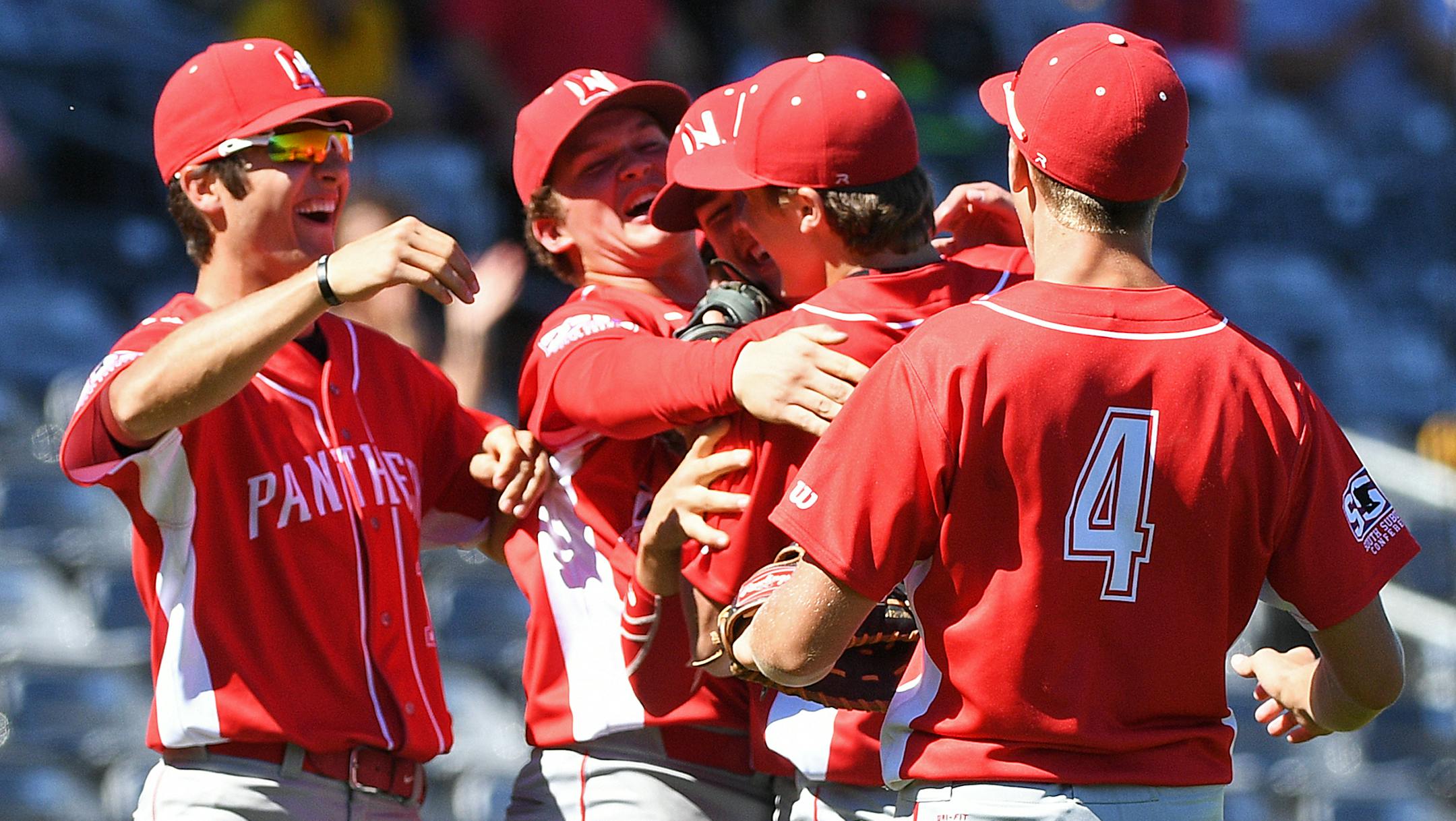Lakeville North players celebrate after defeating Maple Grove 2-1 in 13 innings. ] Isaac Hale ï isaac.hale@startribune.com Lakeville North defeated Maple Grove 2-1 in 13 innings in the High School State Division 4A Quarterfinals at CHS Field in St. Paul, MN, on Thursday, June 16, 2016.