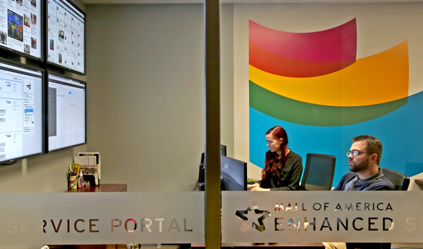 Alisha Yost and Boone Sorenson watched the screen filled with social media traffic from guests or any people talking about the Mal of America. ] (KYNDELL HARKNESS/STAR TRIBUNE) kyndell.harkness@startribune.com Hanging out at the ESP Center at the MOA in Bloomington Min., Saturday November 14, 2015. ORG XMIT: MIN1511211520550205