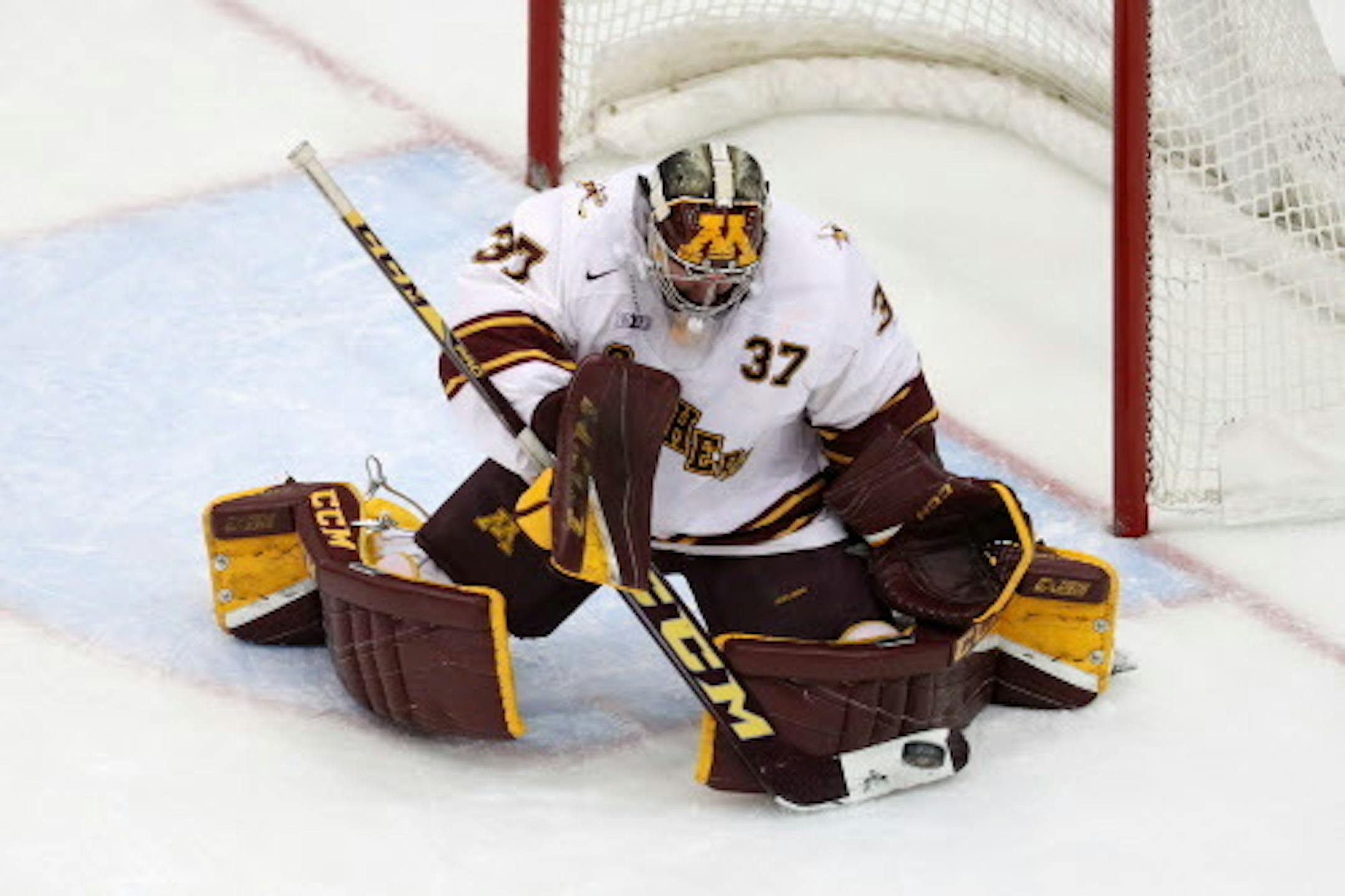 Minnesota Golden Gophers goaltender Eric Schierhorn (37) made a stick save in the third period. ] ANTHONY SOUFFLE ' anthony.souffle@startribune.com