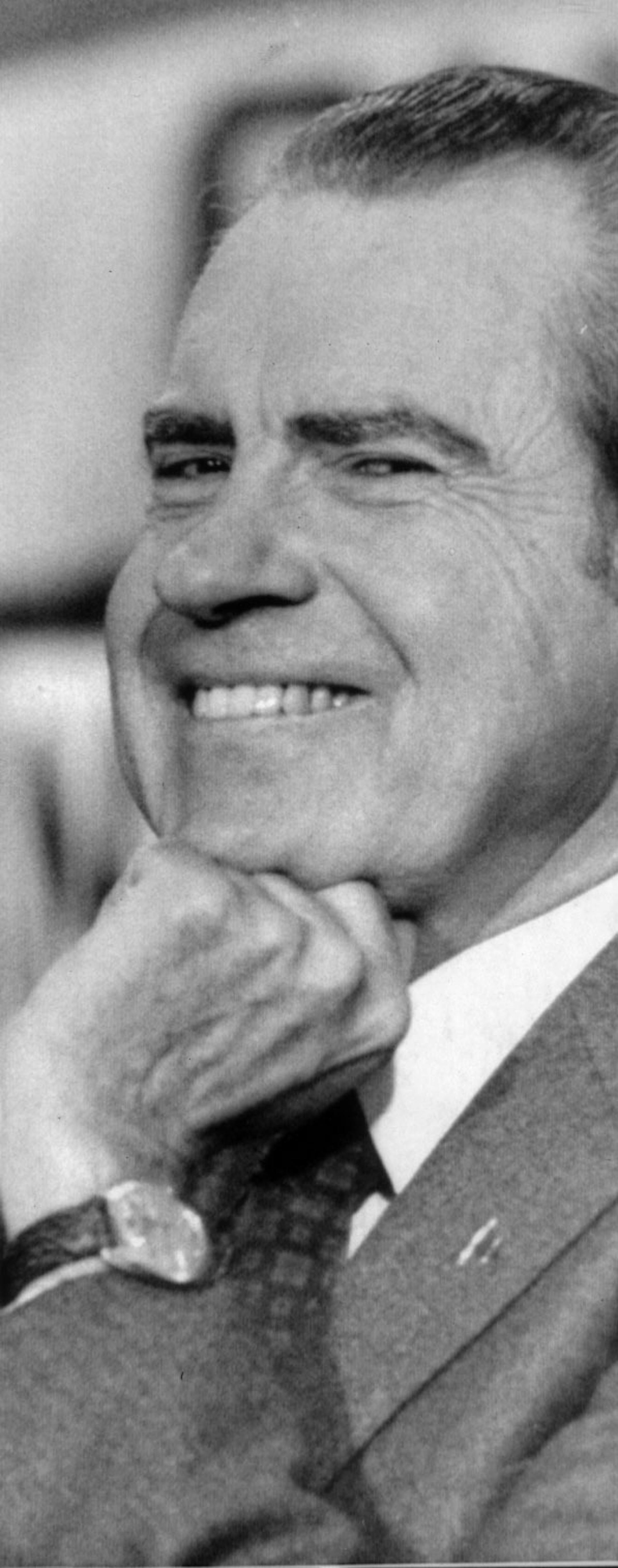 This is a 1972 photo of former U.S. President Richard M. Nixon. Here he is waiting to be introduced at a campaign rally, taking a look around at Chicago O'Hare airport military installation