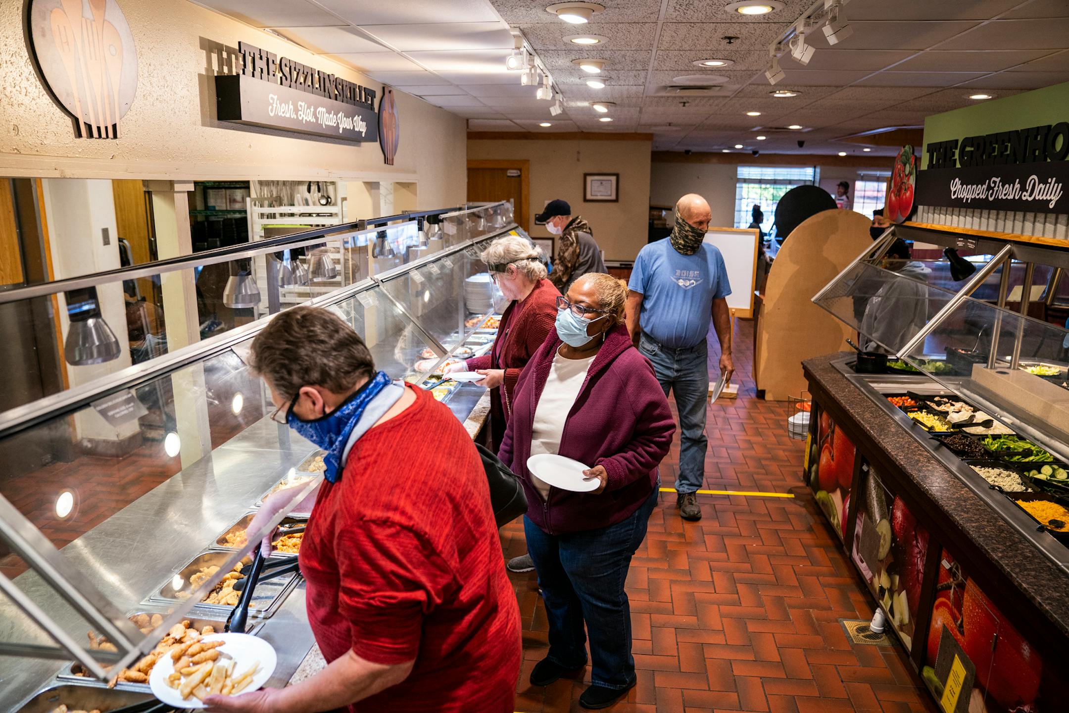 Customers wore mandatory masks at the self-serve buffet area at the Golden Coral Buffet and Grill. ] LEILA NAVIDI • leila.navidi@startribune.com BACKGROUND INFORMATION: Golden Corral Buffet and Grill in Maple Grove on Friday, October 2, 2020.