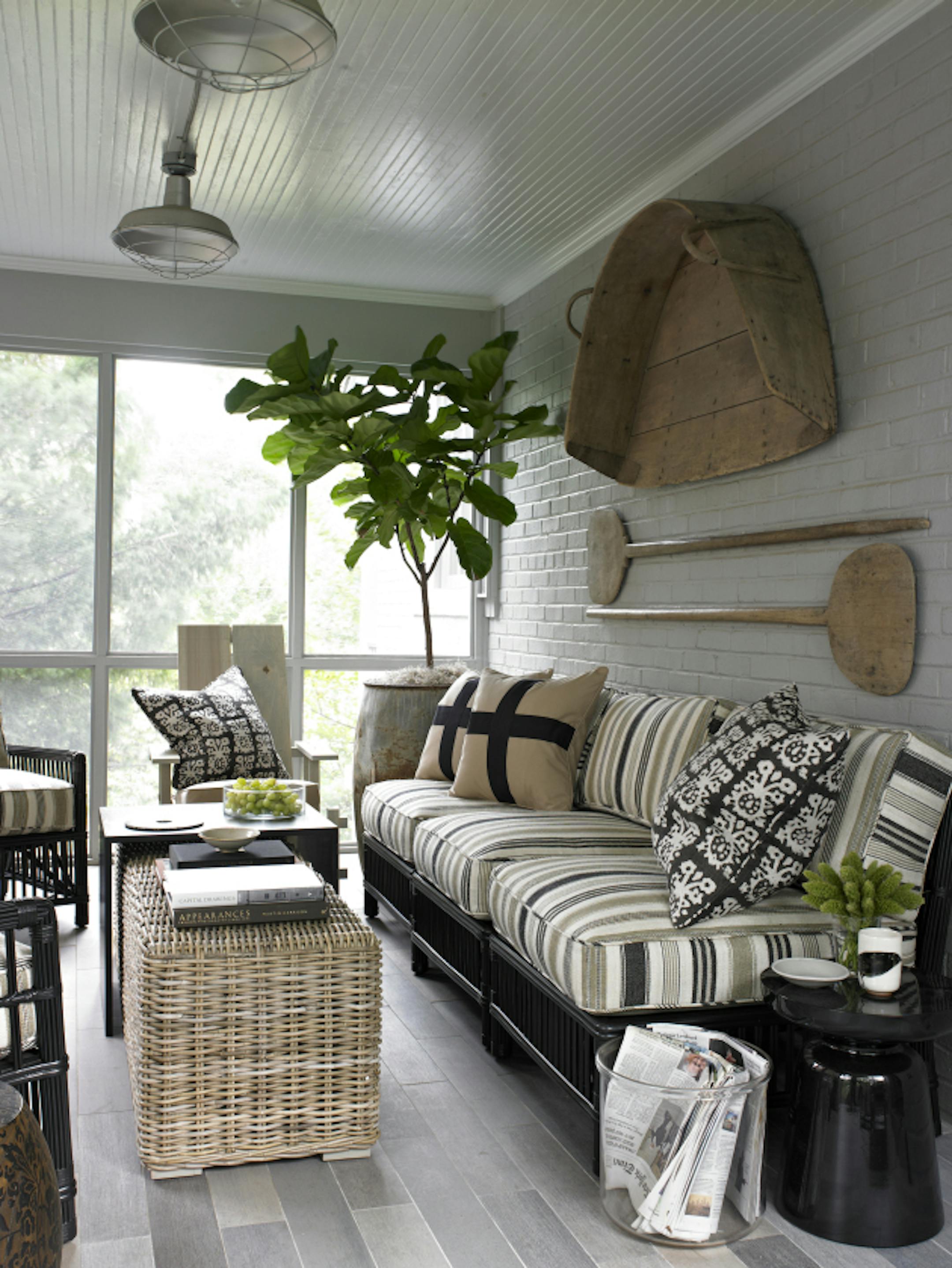 Screened porches are a classic way for homeowners to enjoy nature by offering exposure to the elements with the protection and comfort of being indoors. Washington designer David Mitchell designer David Mitchell decorated his porch to capture the nostalgic feeling of summer camp in North Carolina, a beloved childhood memory. Illustrates PORCH (category l), by Megan Buerger (c) 2012, The Washington Post. Moved Monday, July 31, 2012.  (MUST CREDIT: Helen Norman)