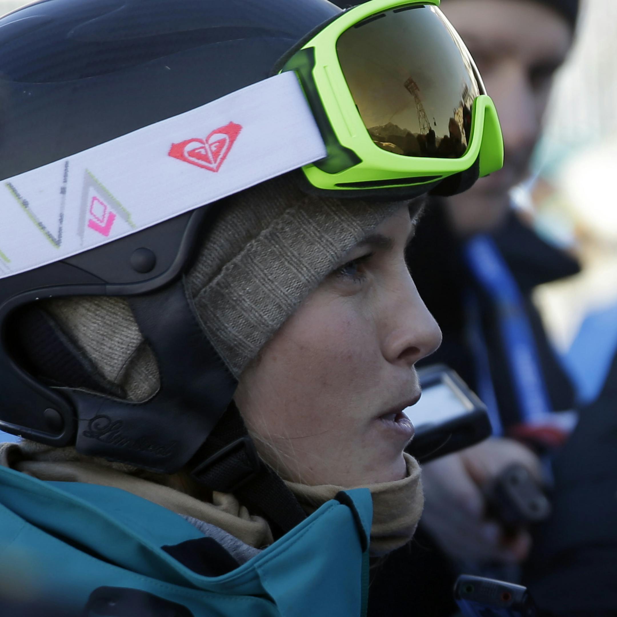 Australia's Torah Bright is interviewed after a run during the women's snowboard slopestyle qualifying at the Rosa Khutor Extreme Park ahead of the 2014 Winter Olympics, Thursday, Feb. 6, 2014, in Krasnaya Polyana, Russia. (AP Photo/Andy Wong)