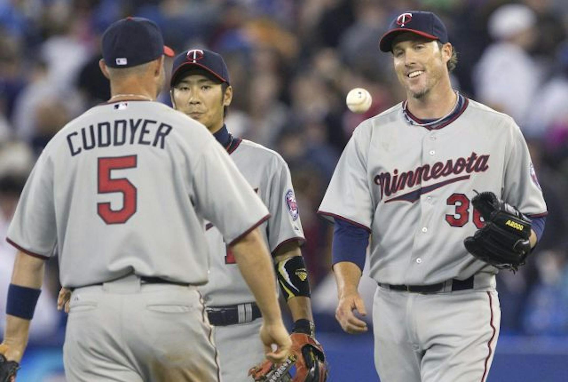 Joe Nathan is all smiles after saving the Twins' first victory.