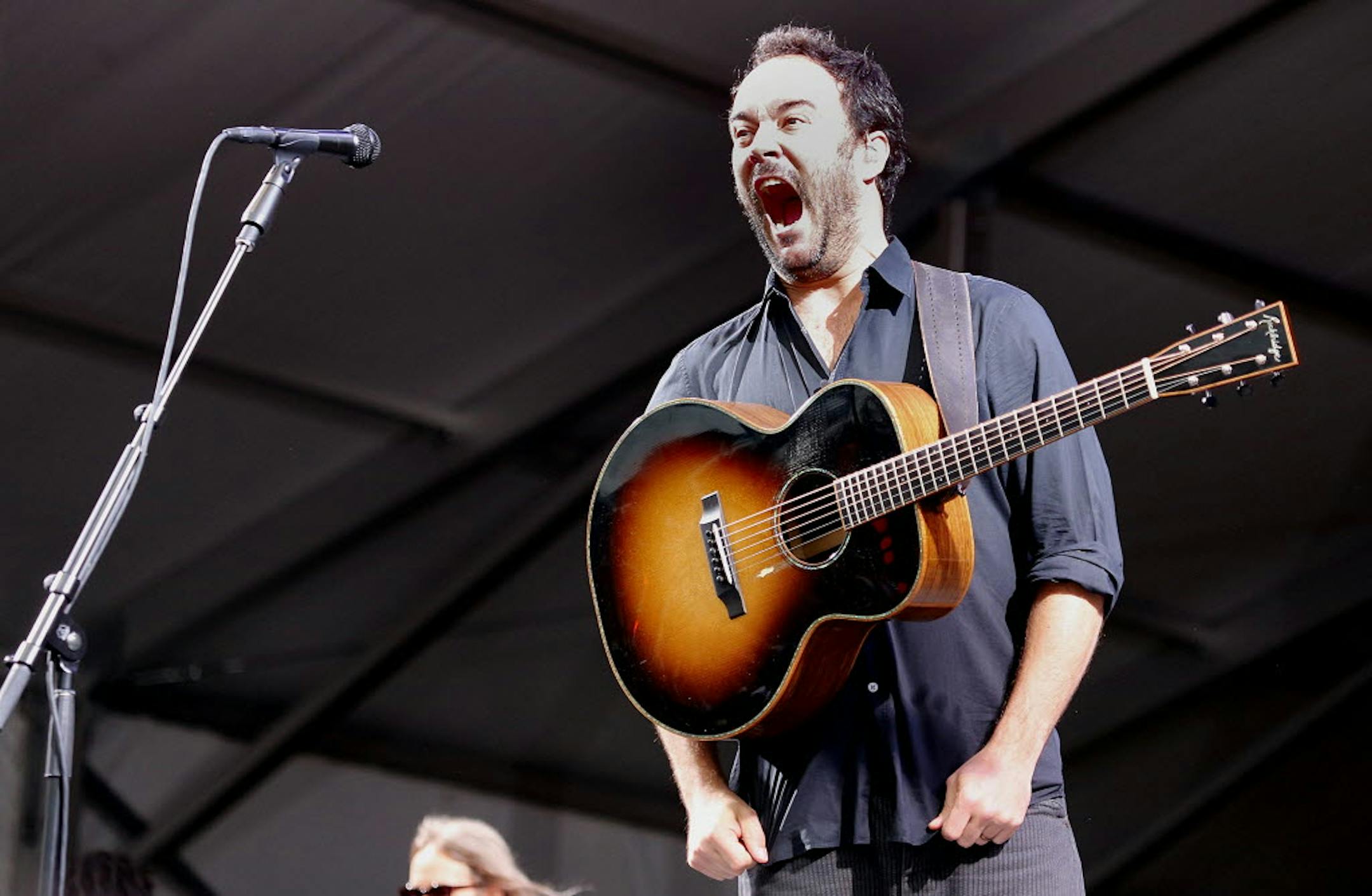 Dave Matthews roars as he begins his performance at the Acura Stage for the New Orleans Jazz and Heritage Festival on Sunday.