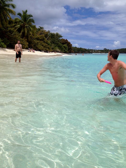 Sam and Jay Miller play Frisbee in the clear Caribbean water at Virgin Islands Natioal Park. Photo by Laura Zahn, special to the Star Tribune