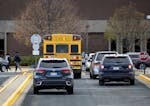 Cars waited to pick students up at Bloomington Jefferson High School. ] CARLOS GONZALEZ • cgonzalez@startribune.com – Bloomington, MN – November