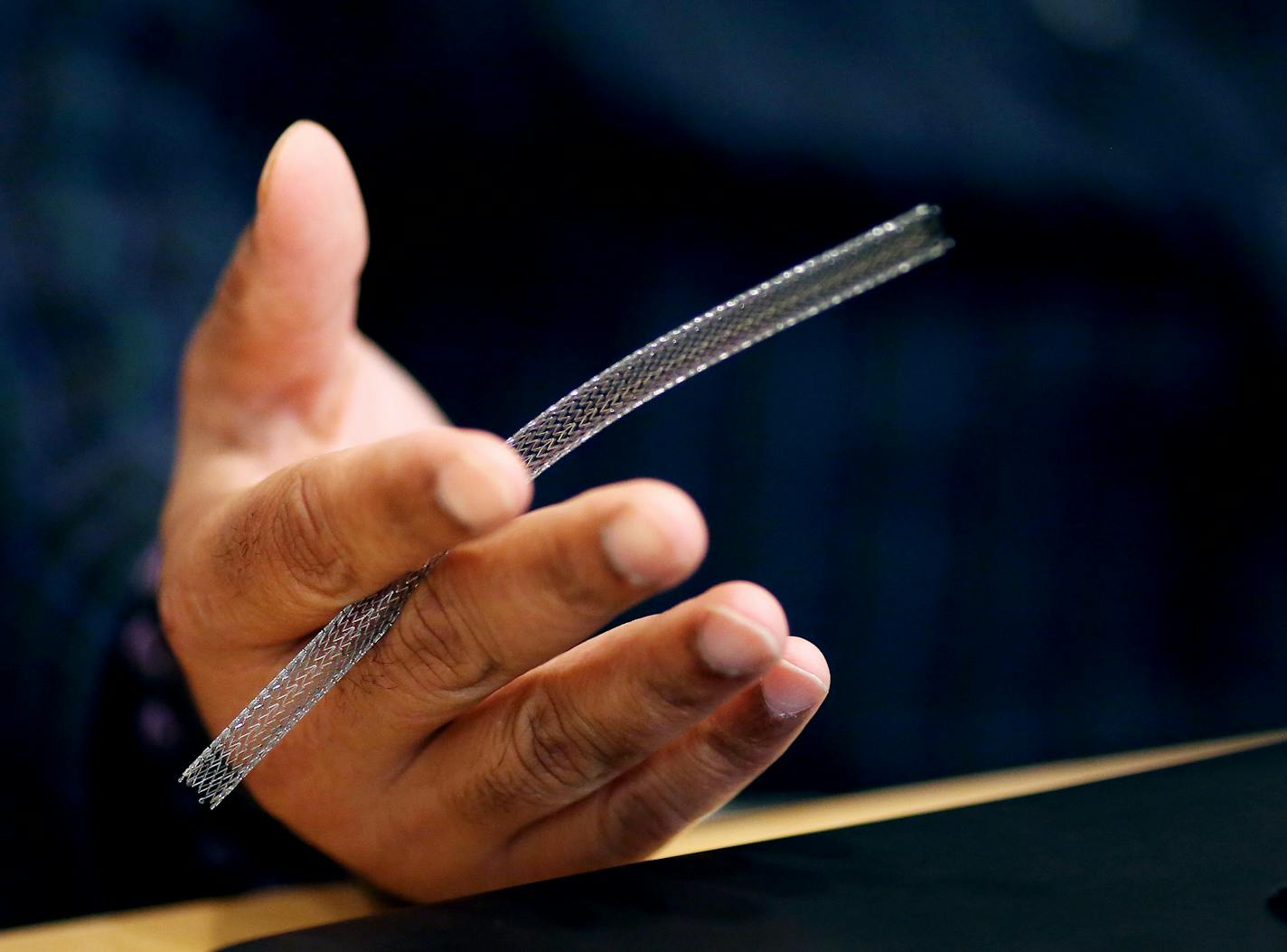 Boston Scientific engineer Jay Kokate held a peripheral stent; the peripheral stent was made by Boston Scientific and designed in Maple Grove. September 2, 2015 in Maple Grove, MN. ] Jerry Holt/ Jerry.Holt@Startribune.com