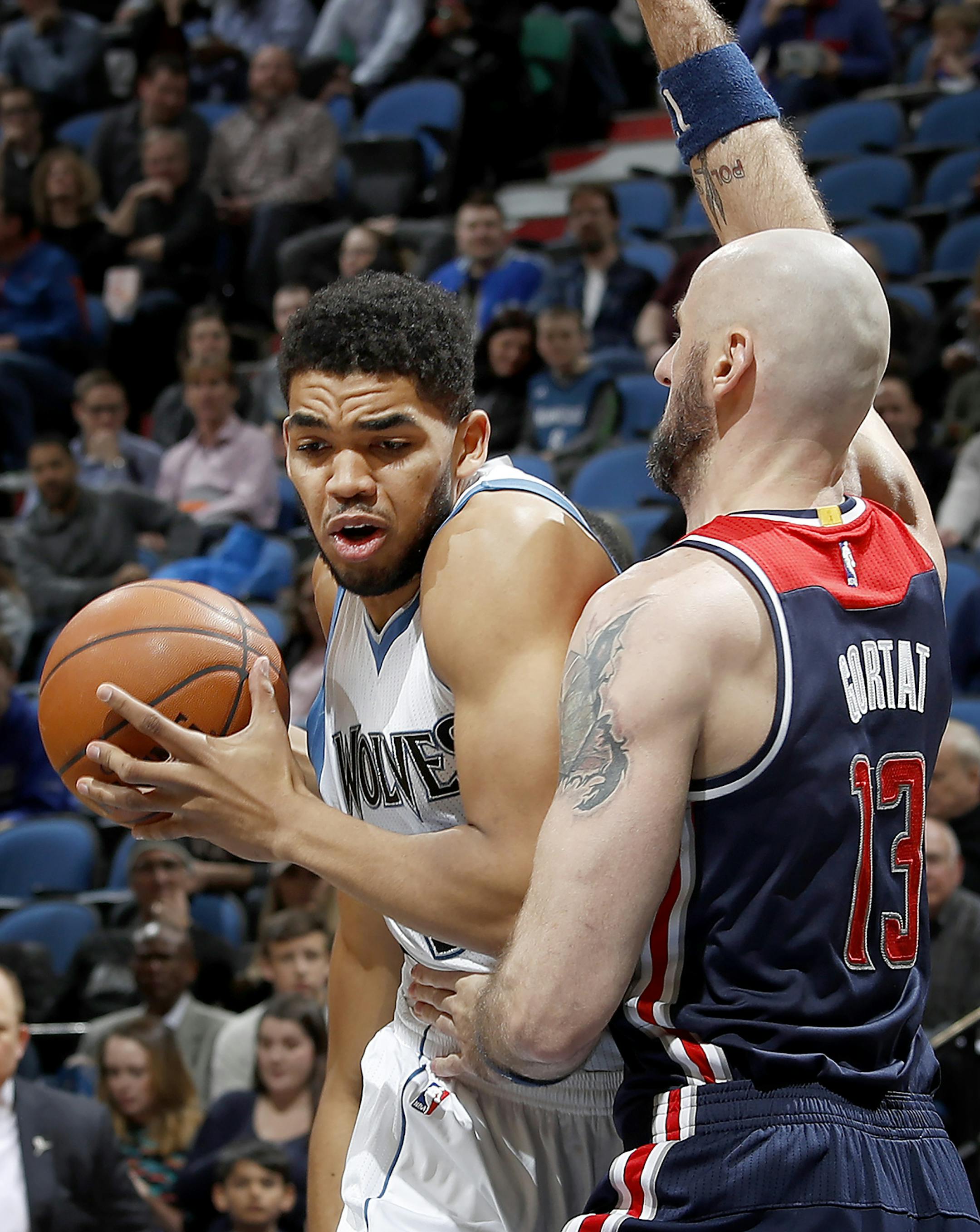 Karl-Anthony Towns was guarded by Marcin Gortat (13) in the first quarter. ] CARLOS GONZALEZ ï cgonzalez@startribune.com - March 13, 2017, Minneapolis, MN, Target Center, NBA Basketball, Minnesota Timberwolves vs. Washington Wizards