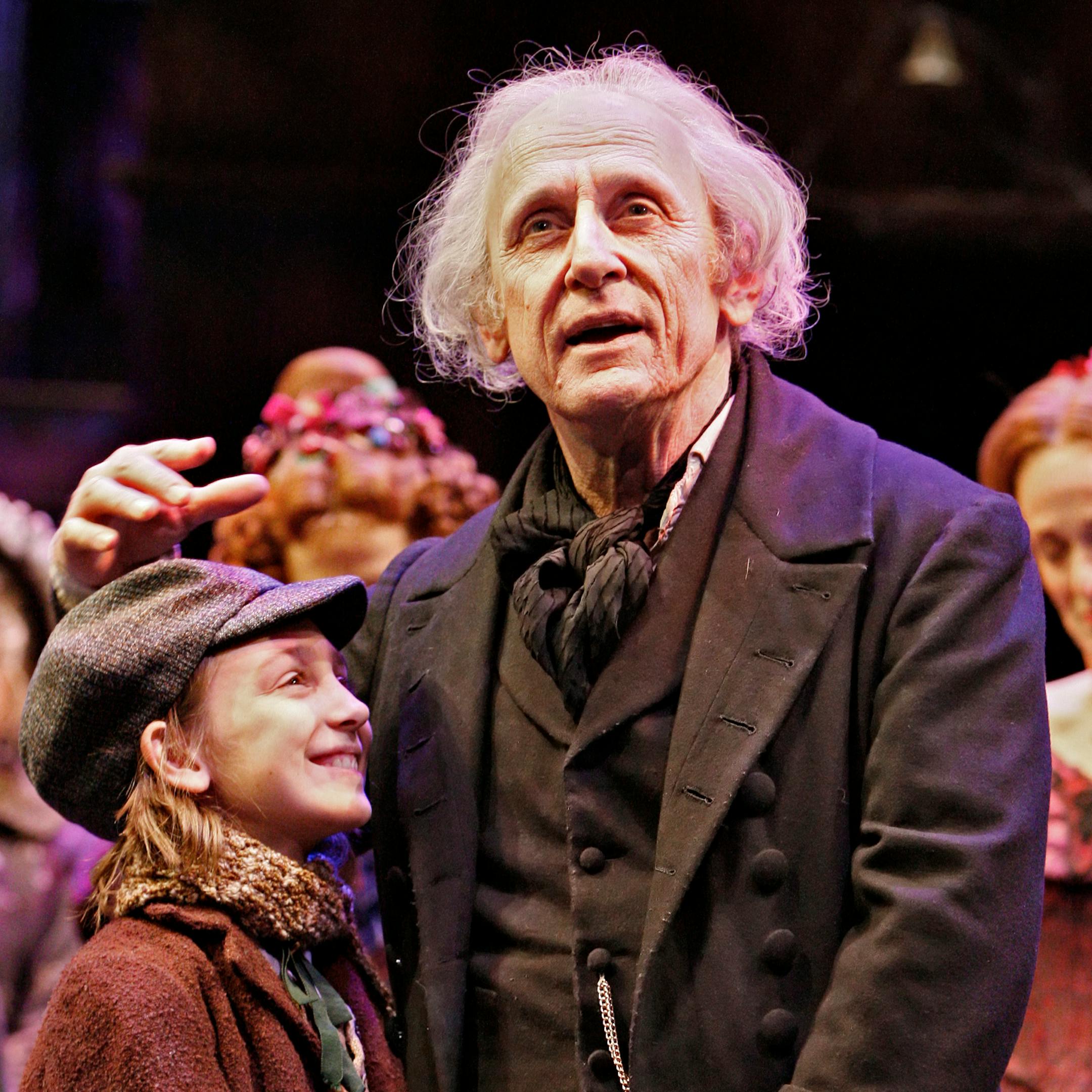 Lily Jones (Tiny Tim) and Raye Birk (Ebenezer Scrooge) in the Guthrie Theater production of A CHRISTMAS CAROL by Charles Dickens during the 2007 season. Birk, played the role of Scrooge in 2005, 2006, 2007, 2008 seasons at the Guthrie.