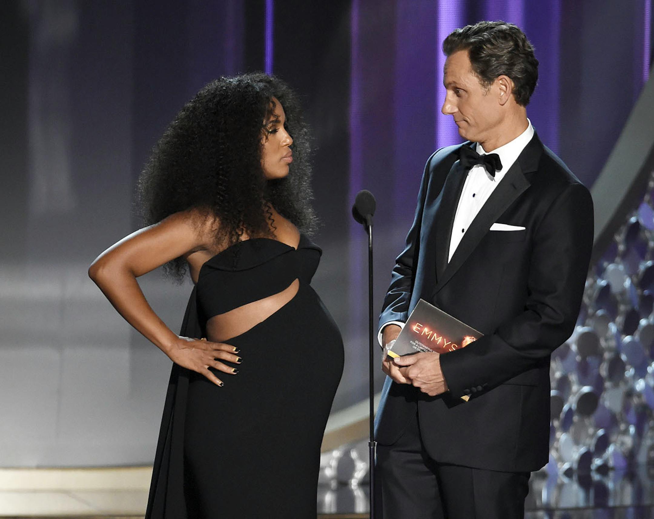 Kerry Washington, left, and Tony Goldwyn present the award for outstanding writing for a limited series, movie or a dramatic special at the 68th Primetime Emmy Awards on Sunday, Sept. 18, 2016, at the Microsoft Theater in Los Angeles.