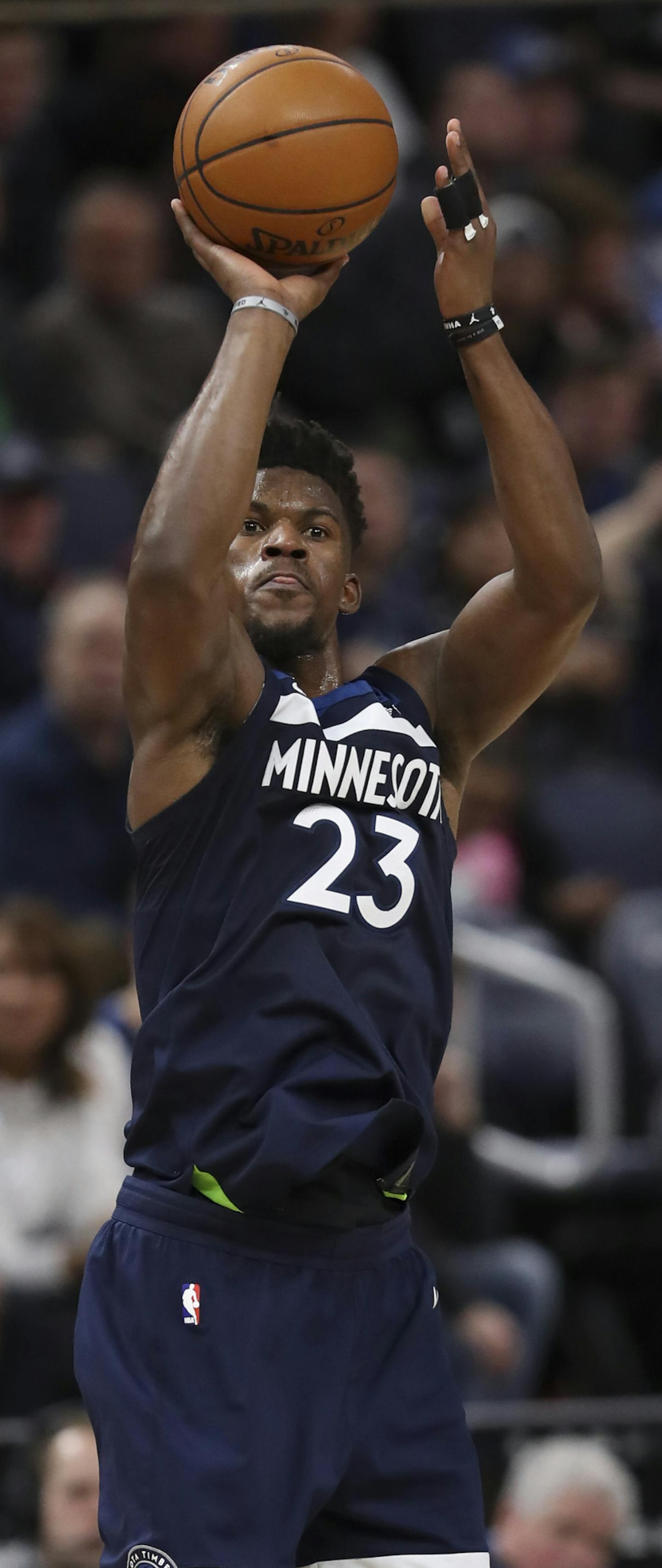 Timberwolves guard Jimmy Butler (23) shot in the fourth quarter over Los Angeles forward Brandon Ingram (14). Butler led all scorers with 28 points. ] JEFF WHEELER &#xef; jeff.wheeler@startribune.com The Minnesota Timberwolves trounced the Los Angles Lakers 114-96 in a New Year's Day NBA game Monday night, January 1, 2018 at Target Center in Minneapolis.