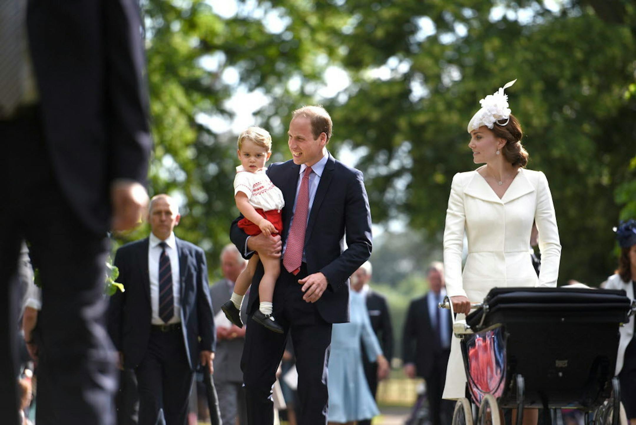 The Duke and Duchess of Cambridge with their son, Prince George, after the christening of their daughter, Princess Charlotte, in King's Lynn, England, July 5, 2015. In a letter issued from Kensington Palace on Friday, the Duke and Duchess of Cambridge expressed concern that members of the news media were going to increasing extremes to photograph their 2-year-old son, Prince George.