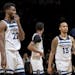 Minnesota Timberwolves forward Andrew Wiggins (22) and Shabazz Napier (13) walked off the court at the end of the game.