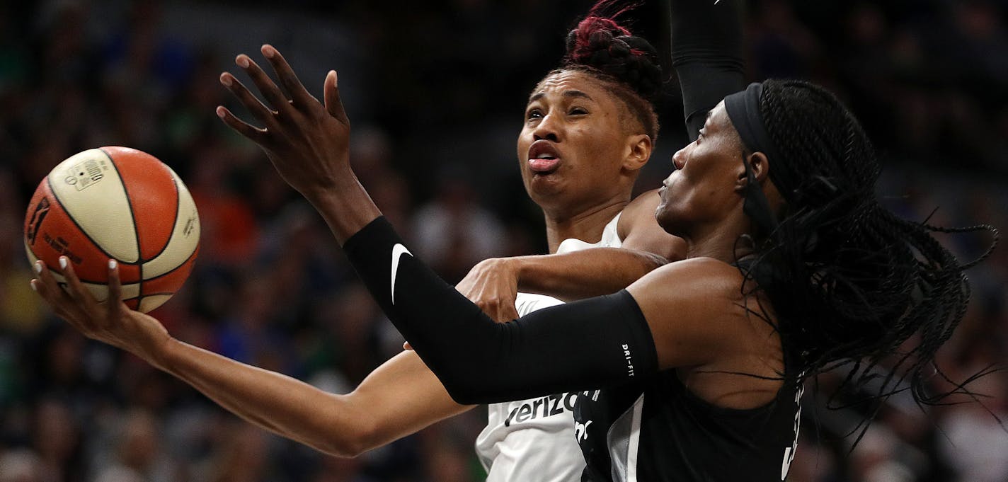 Team Parker forward Angel McCoughtry (35) drove to the basket past Team Delle Donne center Sylvia Fowles (34) in the first half. ] ANTHONY SOUFFLE &#xef; anthony.souffle@startribune.com Team Delle Donne played Team Parker in the annual WNBA All Star Game Saturday, July 28, 2018 at the Target Center in Minneapolis.