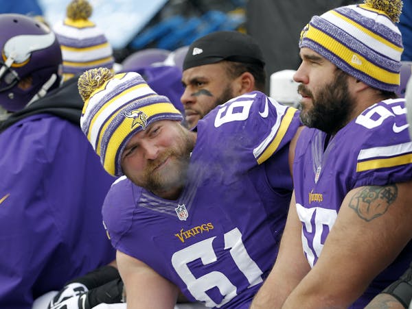 Vikings guard Joe Berger, left, and center John Sullivan, right, shown in 2014, have both played center during the preseason.