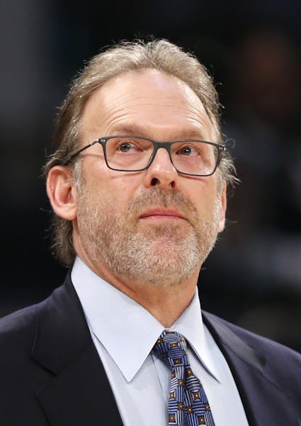 New York Knicks interim head coach Kurt Rambis, coaching his first game in place of Derel Fisher, who's was fired Monday, stands watches from the benc
