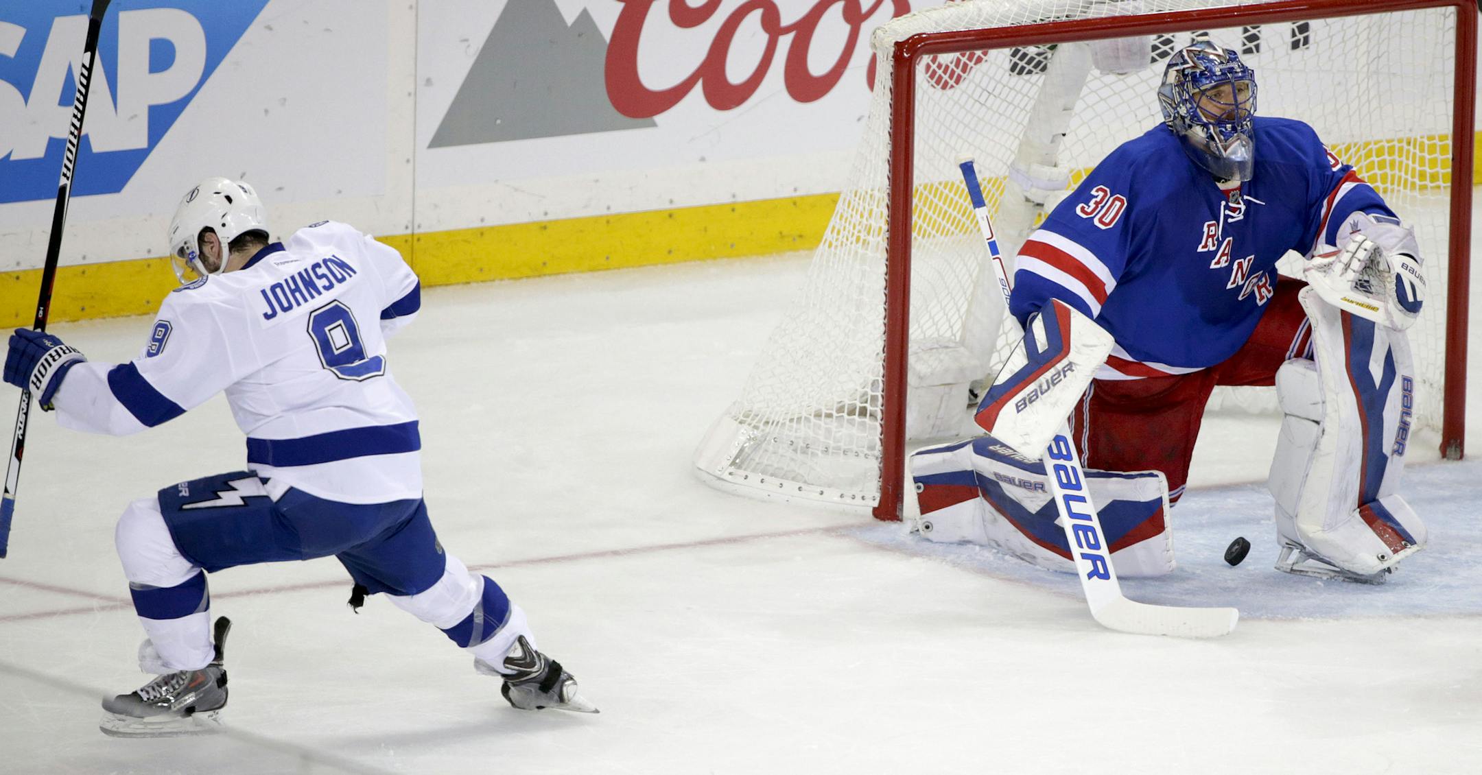 Tampa Bay Lightning center Tyler Johnson (9) reacts after scoring his second goal of the game during the first period of Game 2 of the Eastern Conference final during the NHL hockey Stanley Cup playoffs, Monday, May 18, 2015, in New York. (AP Photo/Frank Franklin II)