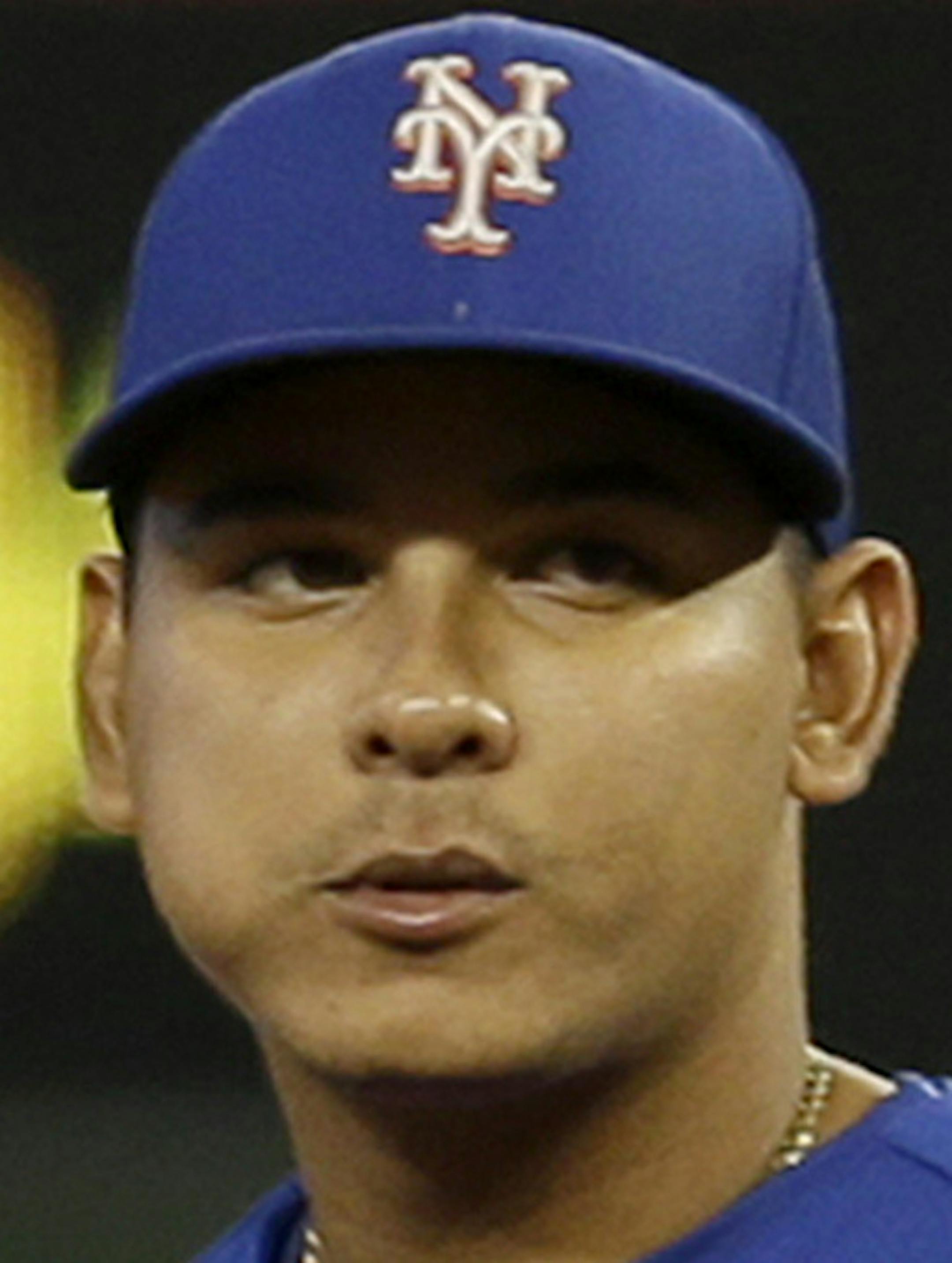 New York Mets shortstop Ruben Tejada (11) walks on the field during a baseball game against the Miami Marlins, Sunday, Sept. 6, 2015, in Miami. (AP Photo/Alan Diaz)
