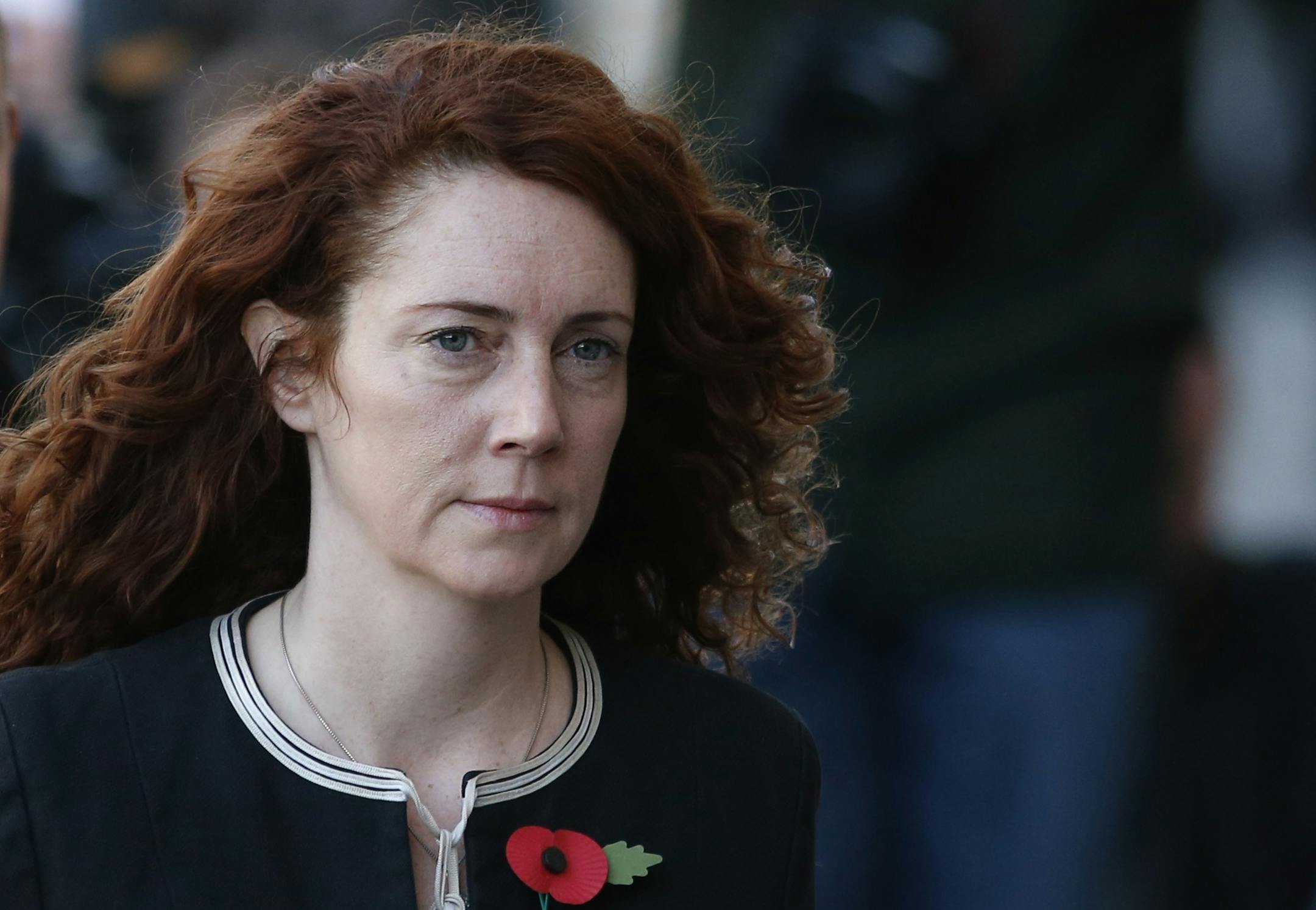 Former News of the World editor Rebekah Brooks arrives at Central Criminal Court in London, Tuesday, Oct. 29, 2013. Once one of the most powerful people in the British media, Brooks, a senior executive for media mogul Rupert Murdoch and associate of Prime Minister David Cameron, is accused on charges of hacking phones and bribing officials while at the now-shuttered Murdoch tabloid.