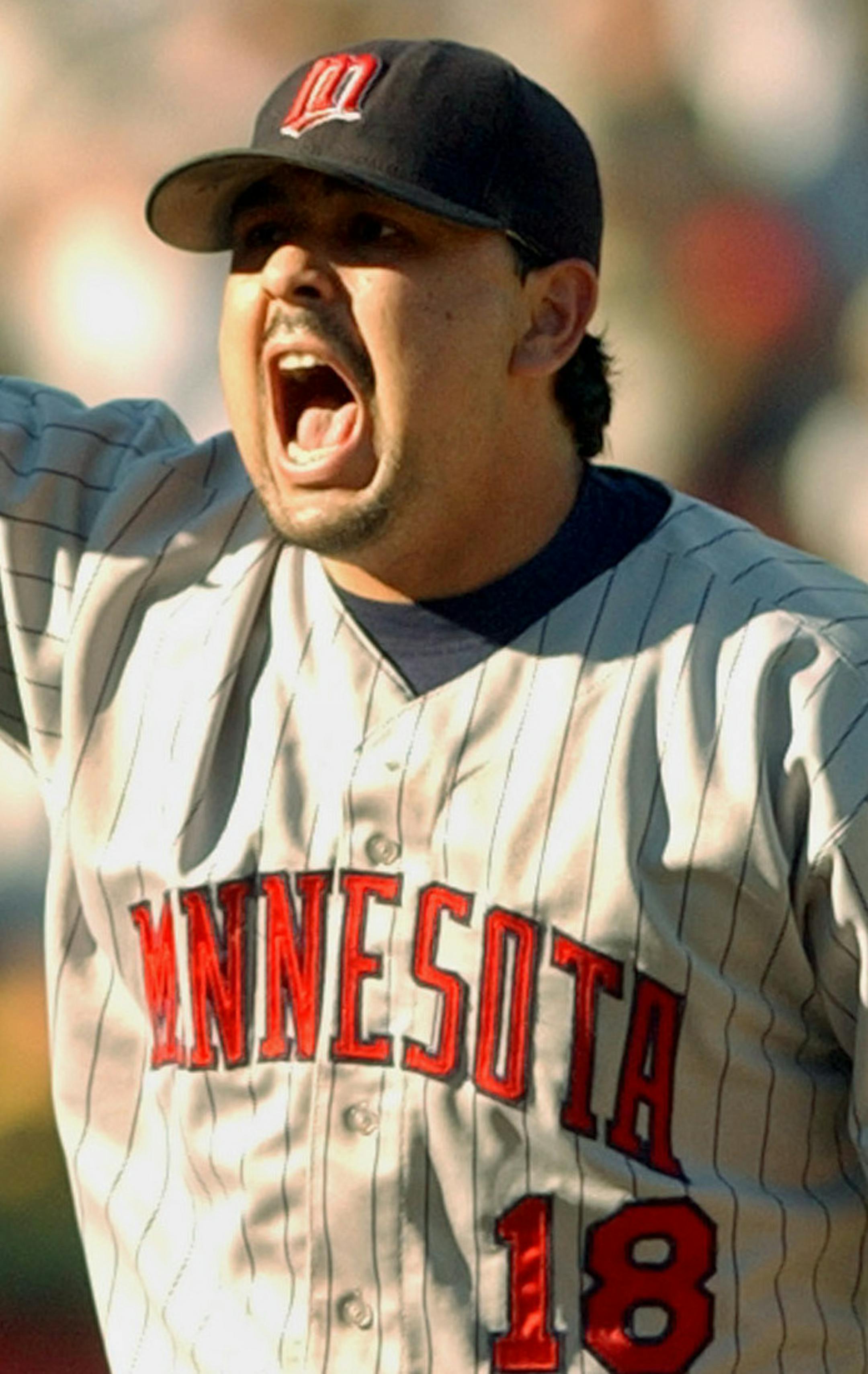 Minnesota Twins closing pitcher Eddie Guardado reacts after the final out in the ninth inning of Game 5 of their American League Division Series against the Oakland Athletics in Oakland, Calif., Sunday, Oct. 6, 2002. The Twins won the game 5-4 to advance to the American League Championship Series. (AP Photo/Ben Margot) ORG XMIT: MIN2013061218455579 ORG XMIT: MIN1306121848546356