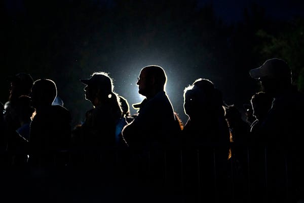 FILE — Attendees listen as President Donald Trump speaks during a rally in Panama City Beach, Fla., on Wednesday evening, May 8, 2019. "That basic s