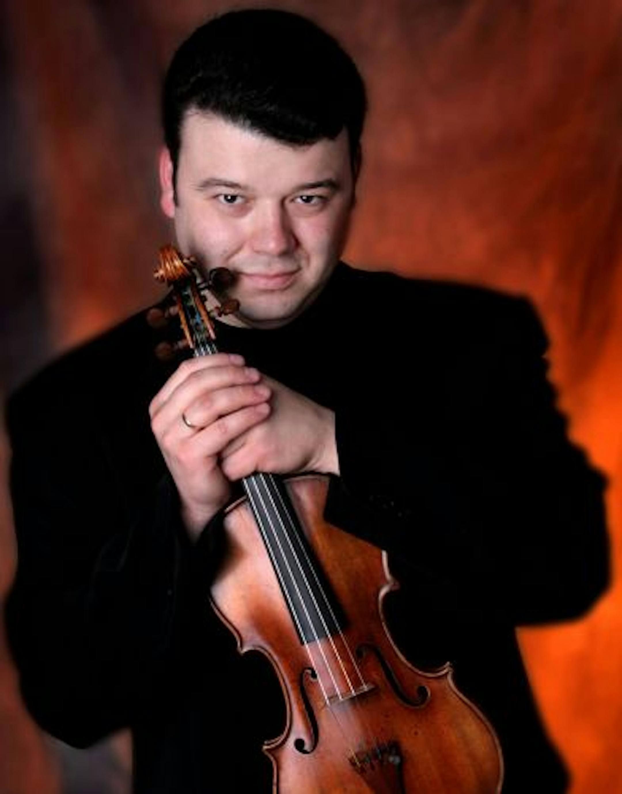 Vadim Gluzman and his 1690 Stradivarius violin.