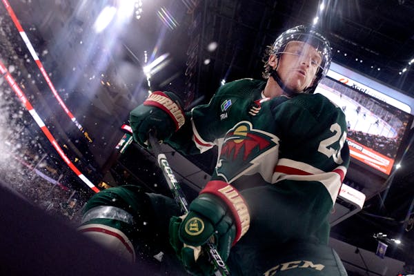Jonas Brodin (25) of the Minnesota Wild chases a puck in the corner Tuesday, February 21, 2022, at Xcel Energy Center in St. Paul, Minn. ] CARLOS GONZ