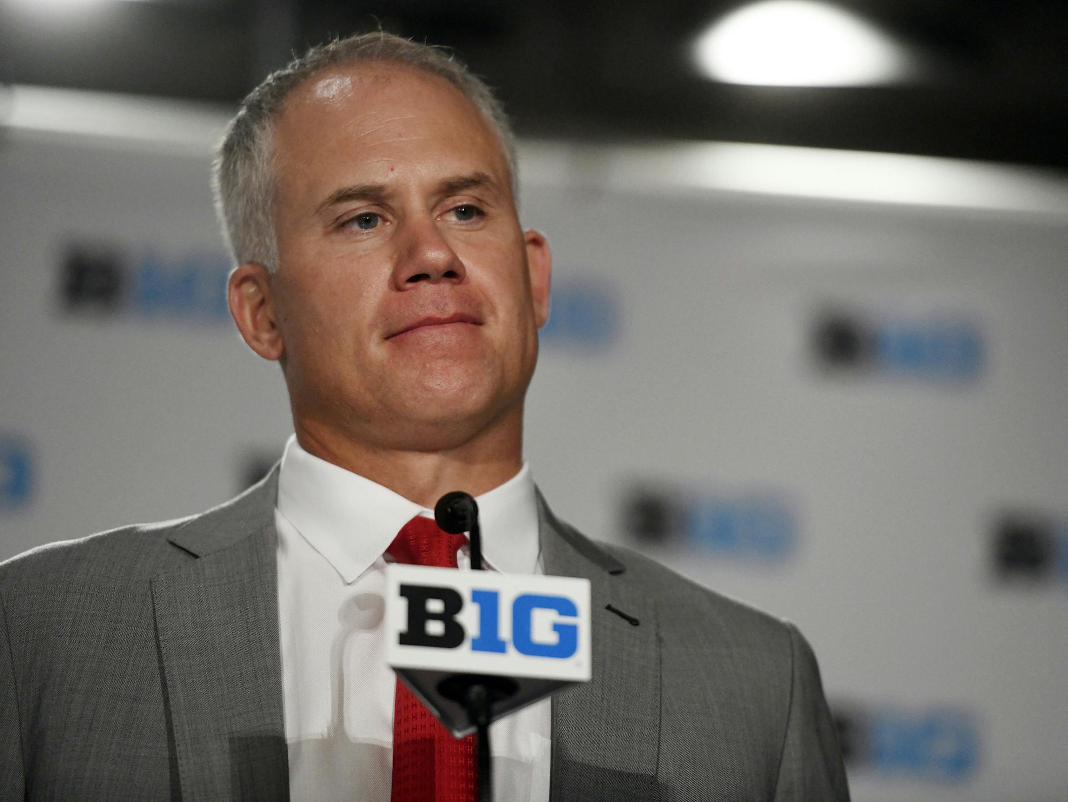 FILE - In this July 24, 2018, file photo, Maryland head coach DJ Durkin speaks at the Big Ten Conference NCAA college football media days in Chicago. The parents of offensive lineman Jordan McNair say suspended University of Maryland coach DJ Durkin should be fired. McNair collapsed during a preseason conditioning drill May 29 and died two weeks later. Durkin was placed on administrative leave Saturday, Aug. 11, after ESPN reported that coaches had been bullying the players. (AP Photo/Annie Rice