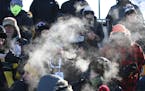 Fans (and players) braved subzero cold to watch Minnetonka and Andover play outside on Lake Bemidji during the 13th annual Hockey Day Minnesota on Jan
