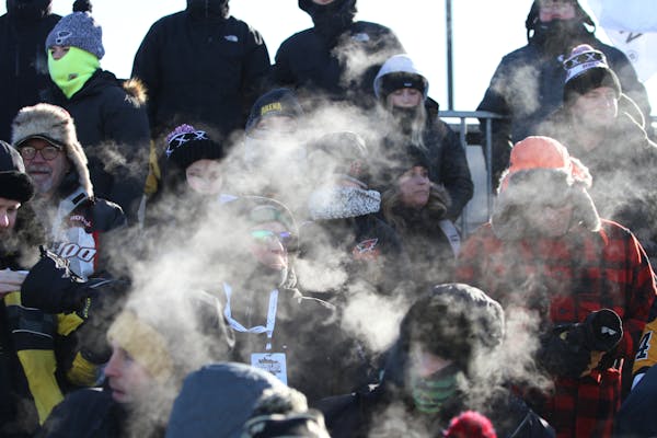 Fans (and players) braved subzero cold to watch Minnetonka and Andover play outside on Lake Bemidji during the 13th annual Hockey Day Minnesota on Jan