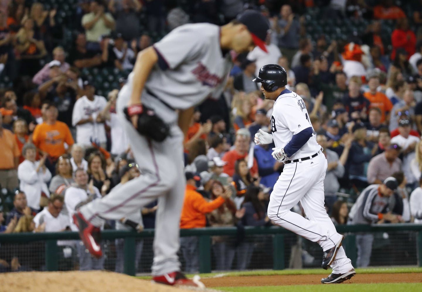 Detroit Tigers' Miguel Cabrera (24) rounds the bases after hitting a solo home run off Minnesota Twins relief pitcher Taylor Rogers (55) in the eighth inning during a baseball game in Detroit, Monday, Sept. 12, 2016. (AP Photo/Paul Sancya)