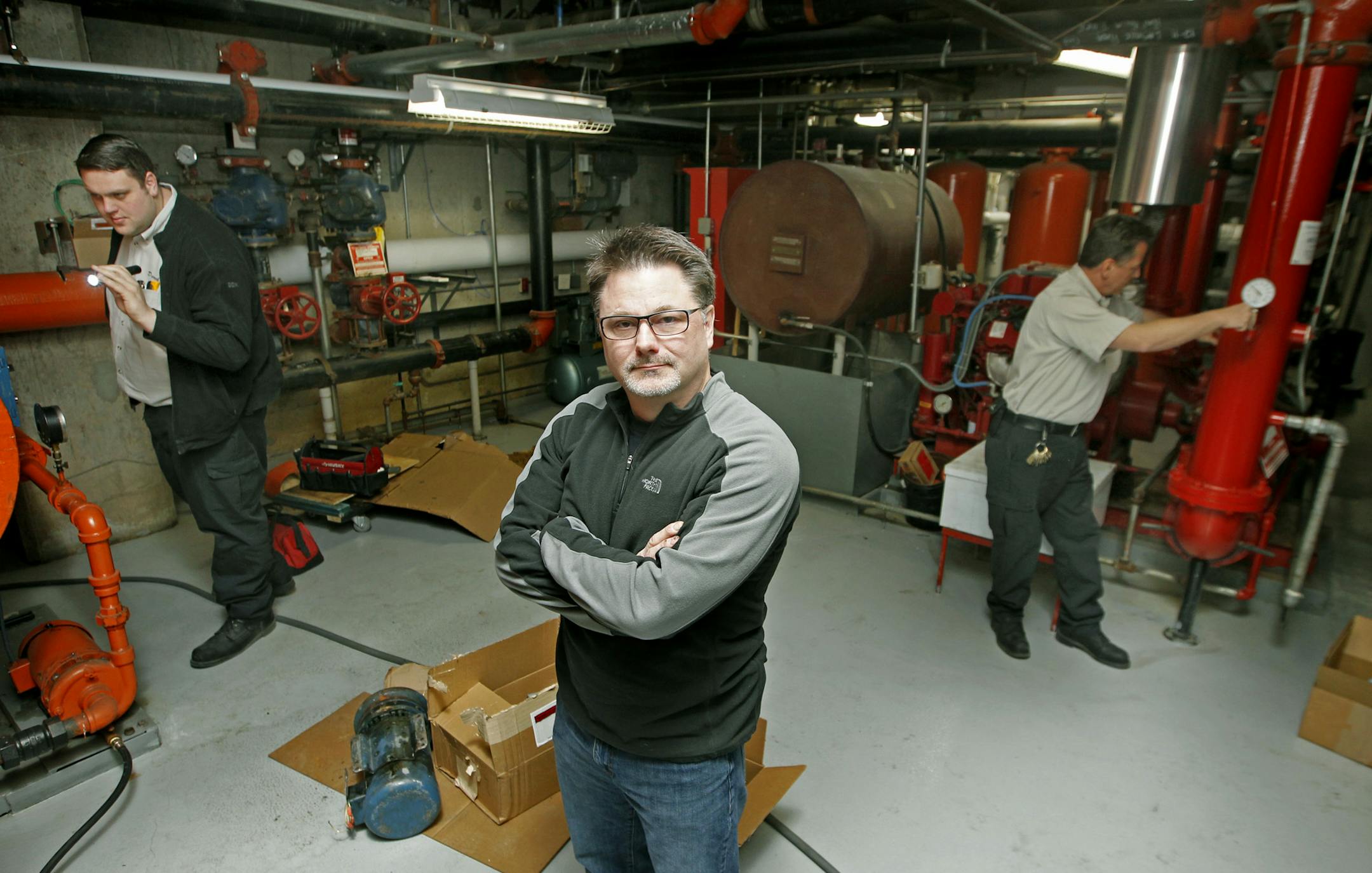 Mike Blomberg supervises operations for LaSalle Plaza, a 30-story office building in downtown Minneapolis. Keeping heat even in the building is difficult.