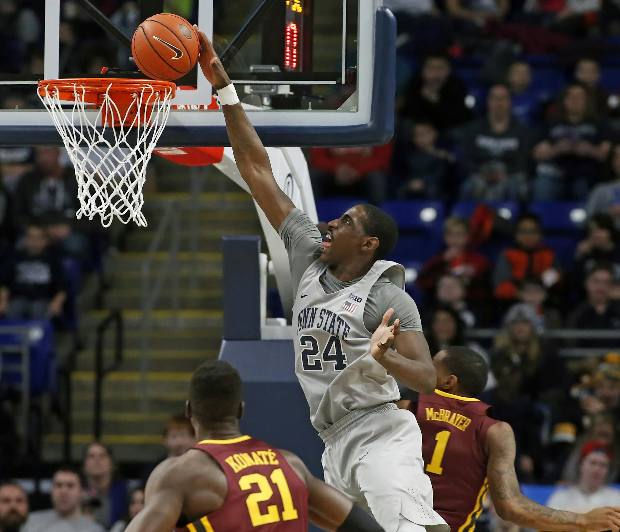 Penn State's Mike Watkins (24) dunks the ball against Minnesota during the second half of an NCAA college basketball game in State College, Pa., Saturday, Jan. 14, 2017. Penn State won the game 52-50. (AP Photo/Chris Knight)