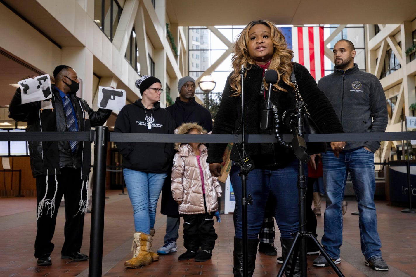 Toshira Garraway speaks at a press conference in support of the Daunte Wright family in the lobby of the Hennepin County Government Center on Friday, Dec. 17, 2021, in Minneapolis. Former Minnesota police officer Kim Potter, who is white, is charged with first- and second-degree manslaughter in the shooting of Wright, a Black motorist, in the suburb of Brooklyn Center. Potter has said she meant to use her Taser – but grabbed her handgun instead – after Wright tried to drive away as officers were trying to arrest him. (AP Photo/Christian Monterrosa)