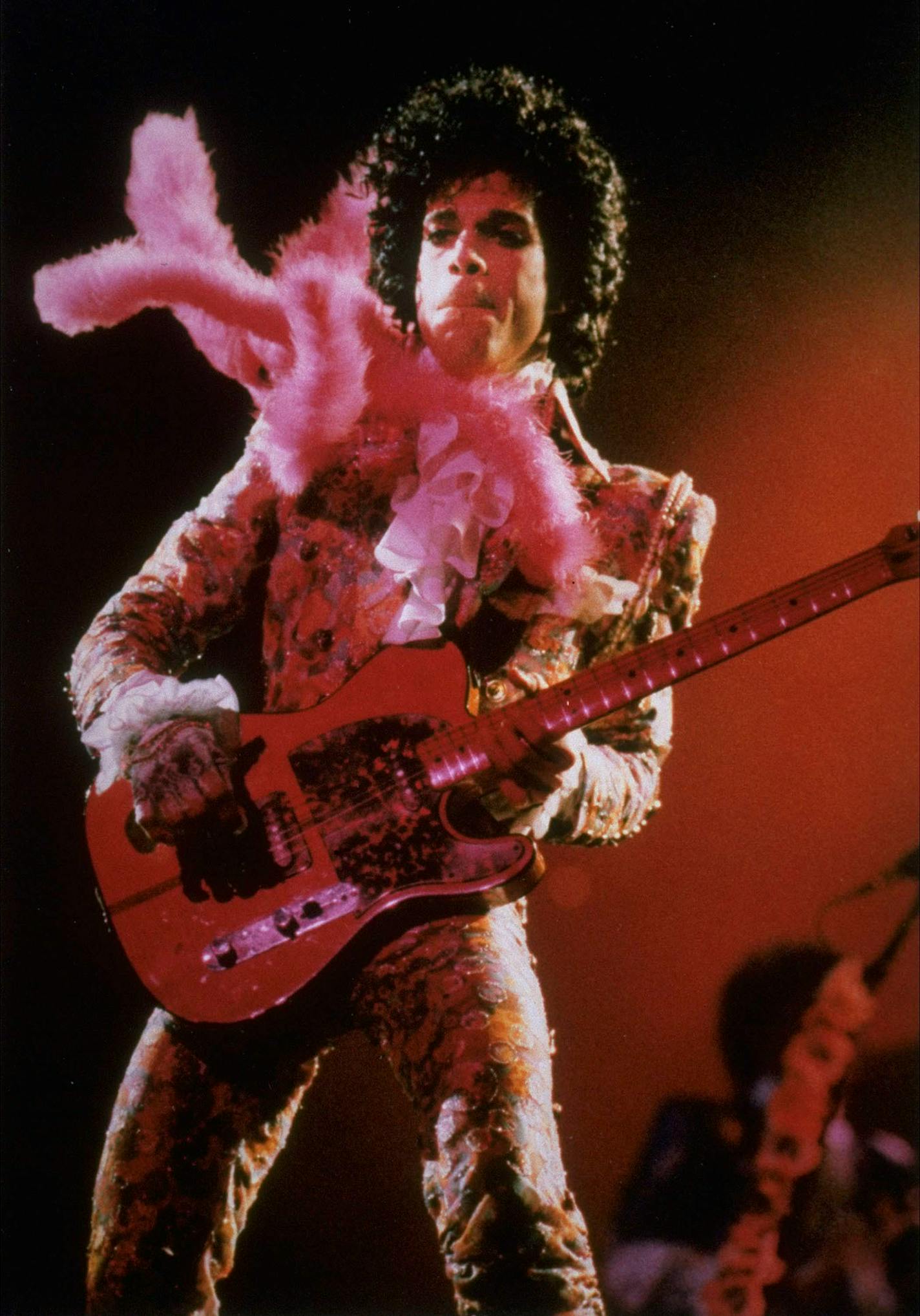 FILE - In this Jan. 11, 1985 file photo, Prince performs before a sold-out audience, in Houston. Prince's publicist has confirmed that Prince died at his his home in Minnesota, Thursday, April 21, 2016. He was 57.