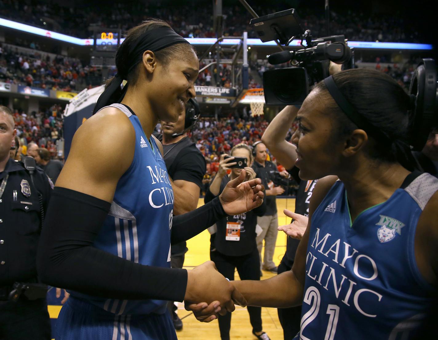 Minnesota Lynx forward Maya Moore (23) and Minnesota Lynx guard Renee Montgomery (21) celebrated after Moore made the winning shot during the last seconds of the game. ] (KYNDELL HARKNESS/STAR TRIBUNE) kyndell.harkness@startribune.com Game 3 of the WNBA finals Lynx vs Indiana at the Target Center in Minneapolis Min., Friday October 9, 2015. Lynx won over Indiana 80-77