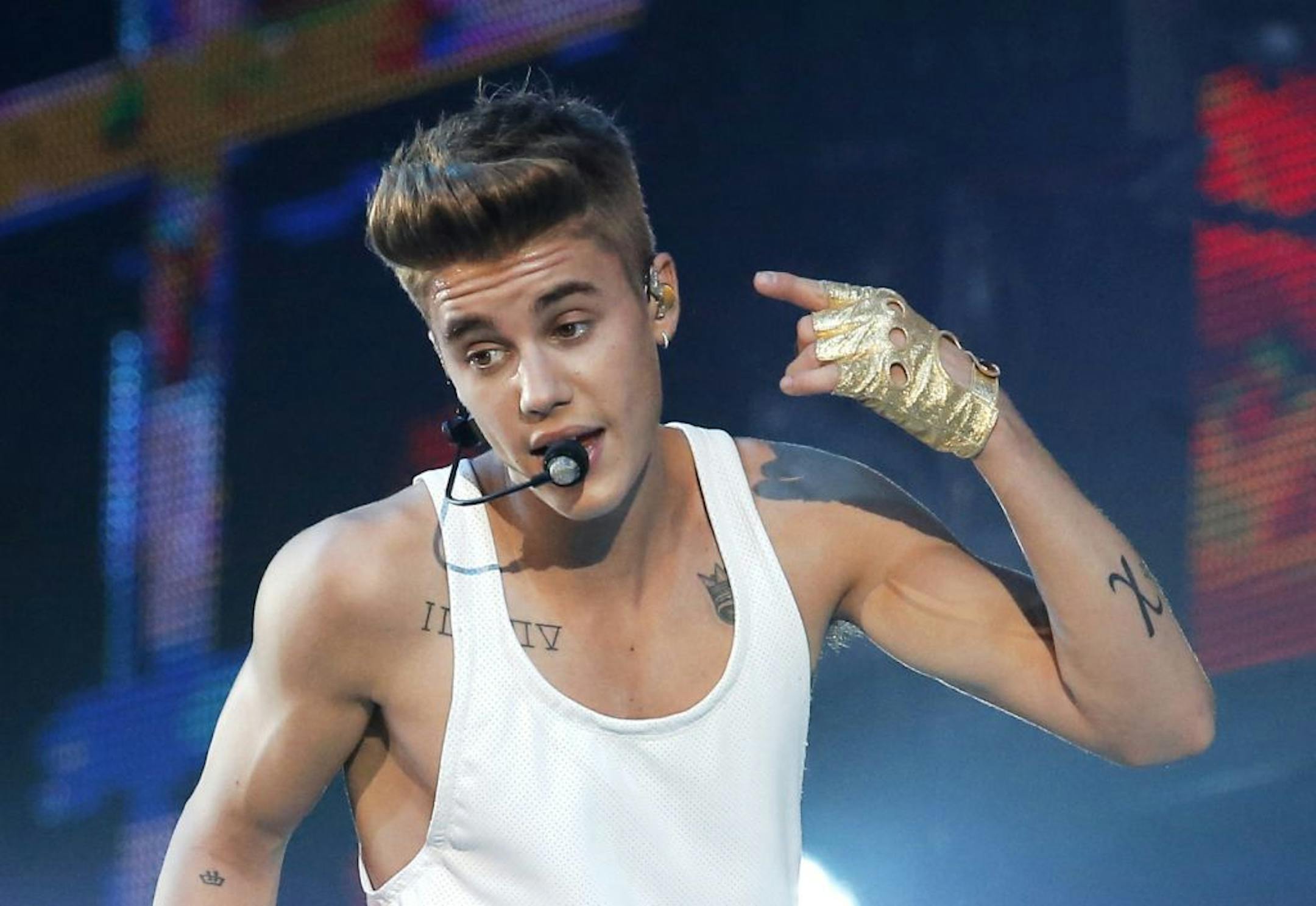 FILE - This March 19, 2013 file photo shows Canadian singer Justin Bieber performing during a concert at Bercy arena in Paris.