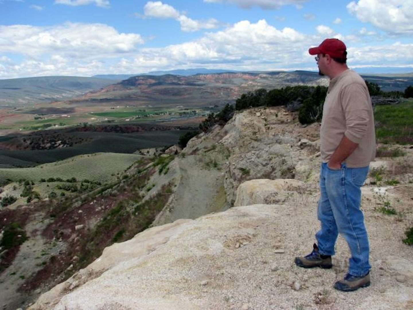 Greg Racay surveying the landscape at the Wyoming Dinosaur Center.