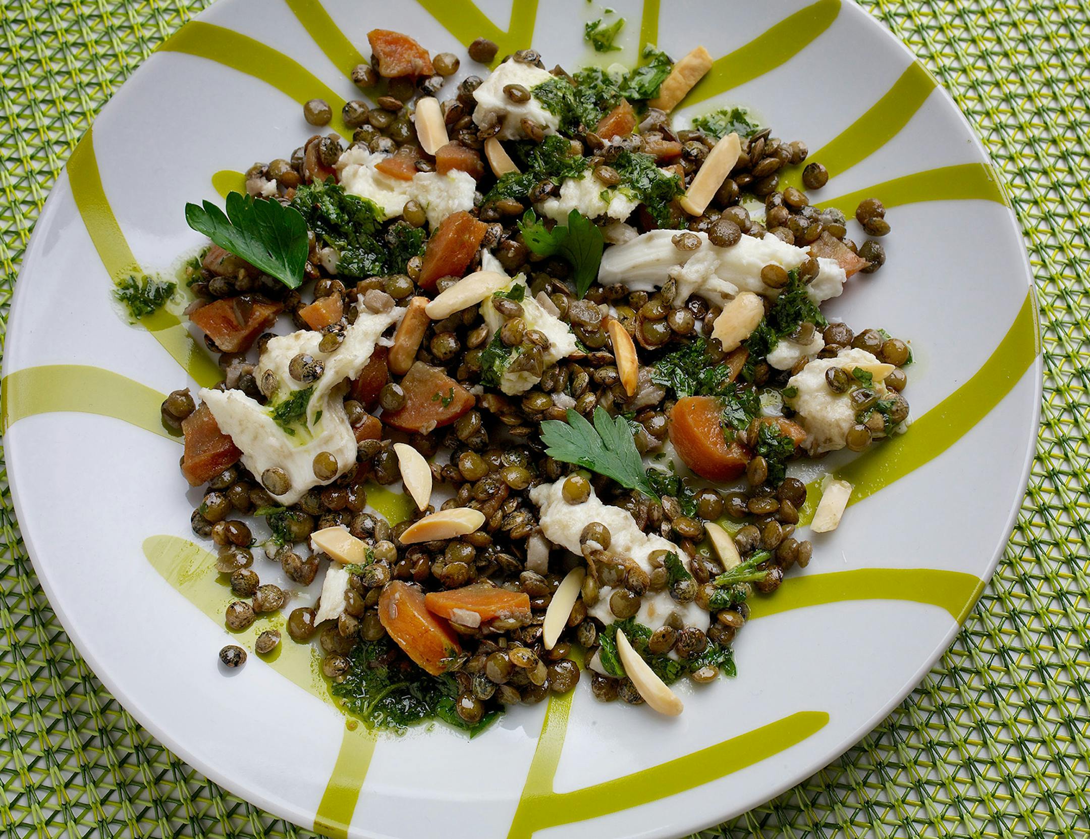 Lentils and Mozzarella. Creamy, fresh mozzarella pairs well with earthy lentils, sharpened with a vinaigrette. Illustrates LENTILS (category d), by Joe Yonan (c) 2014, The Washington Post. Moved Monday, Jan. 13, 2014. (MUST CREDIT: Photo for The Washington Post by Deb Lindsey)