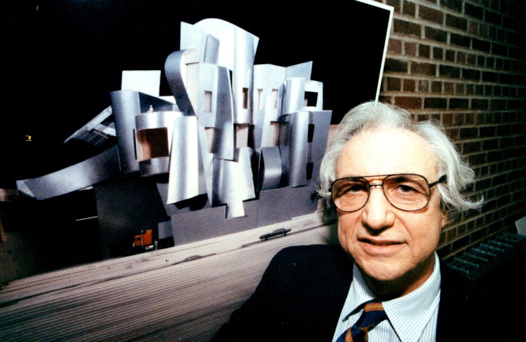 Architect Frank Gehry with a rendering in November 1990.