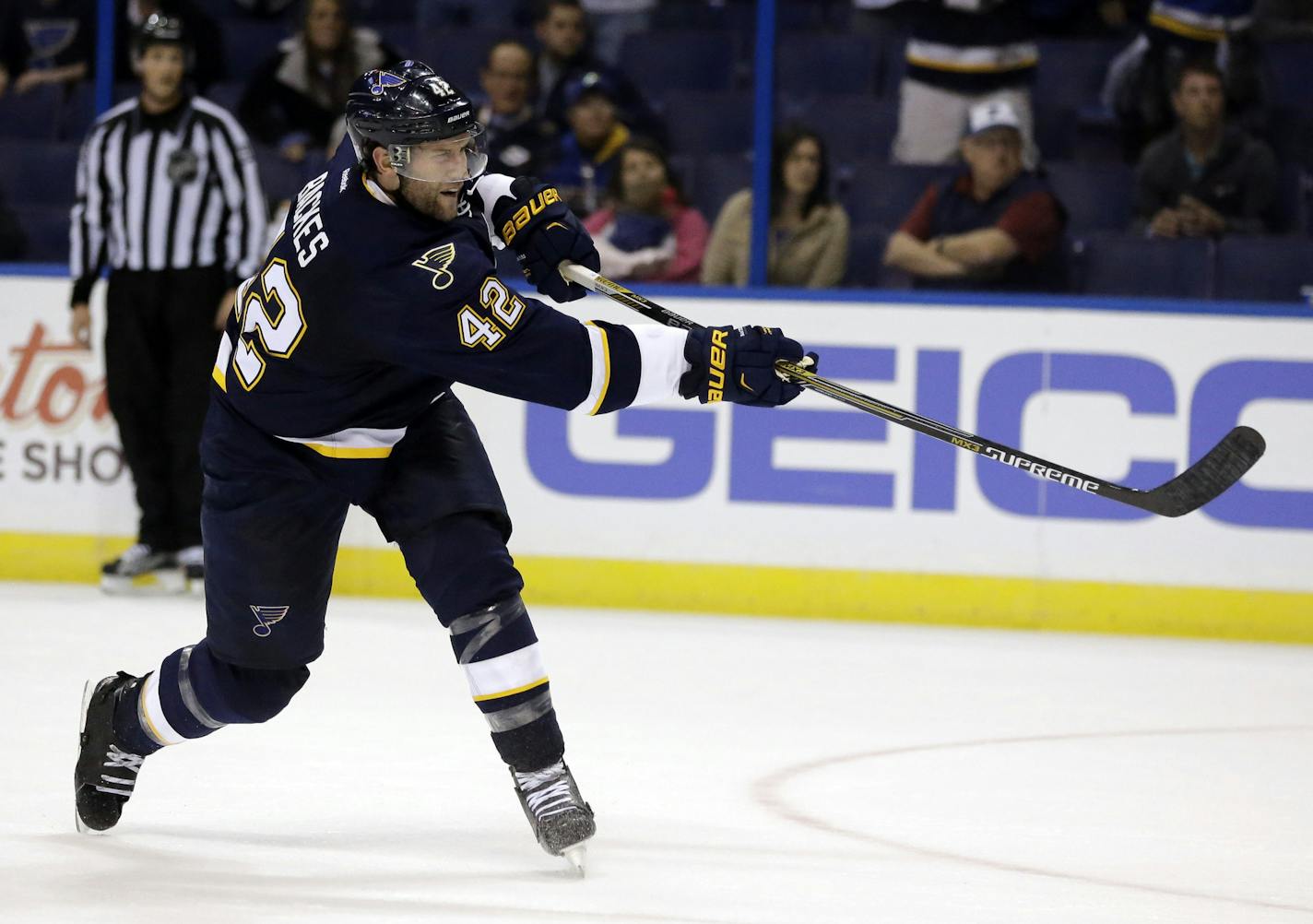 St. Louis Blues' David Backes scores the game-winning goal during overtime of an NHL hockey game against the Minnesota Wild Saturday, Oct. 31, 2015, in St. Louis. The Blues won 3-2 in overtime. (AP Photo/Jeff Roberson)