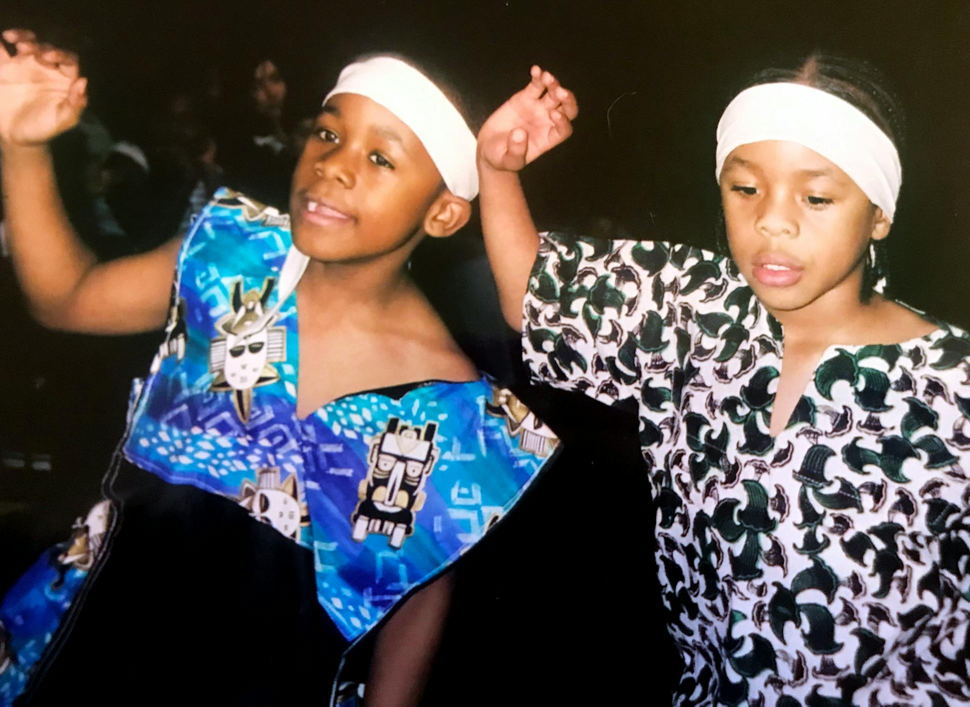 In elementary school, Amir Locke, right, and older brother Andre Jr. took African dance and drum classes. Their mother, Karen Wells, says the experience helped the naturally shy Amir open up.